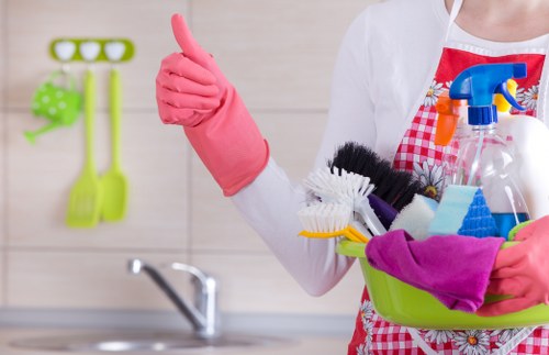 Kingston cleaning team working with organized tools in a business space